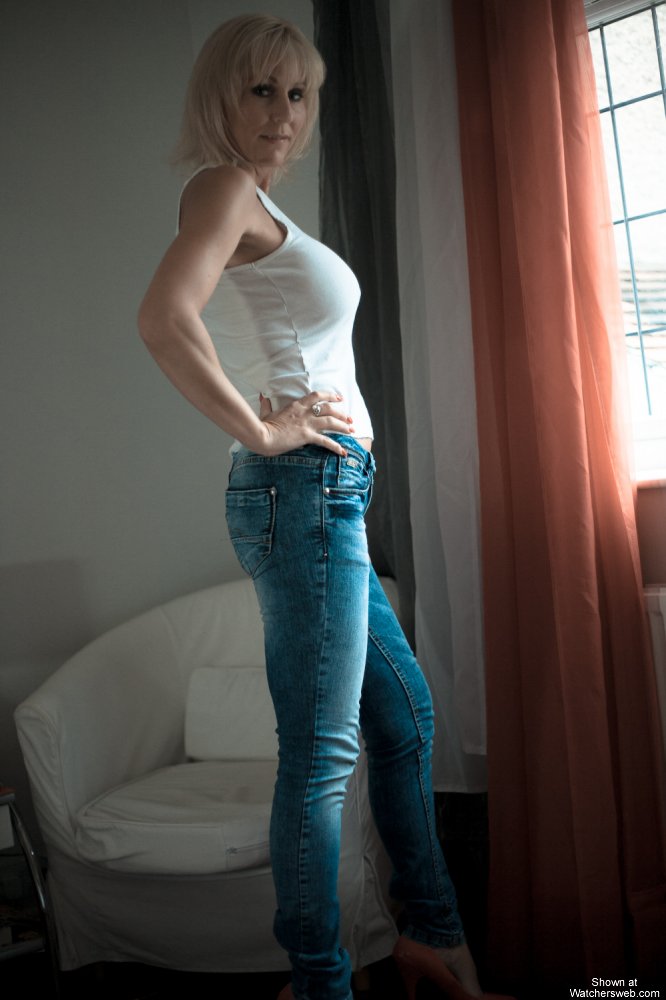 Jan Burton's Blue Jeans & White Vest #0